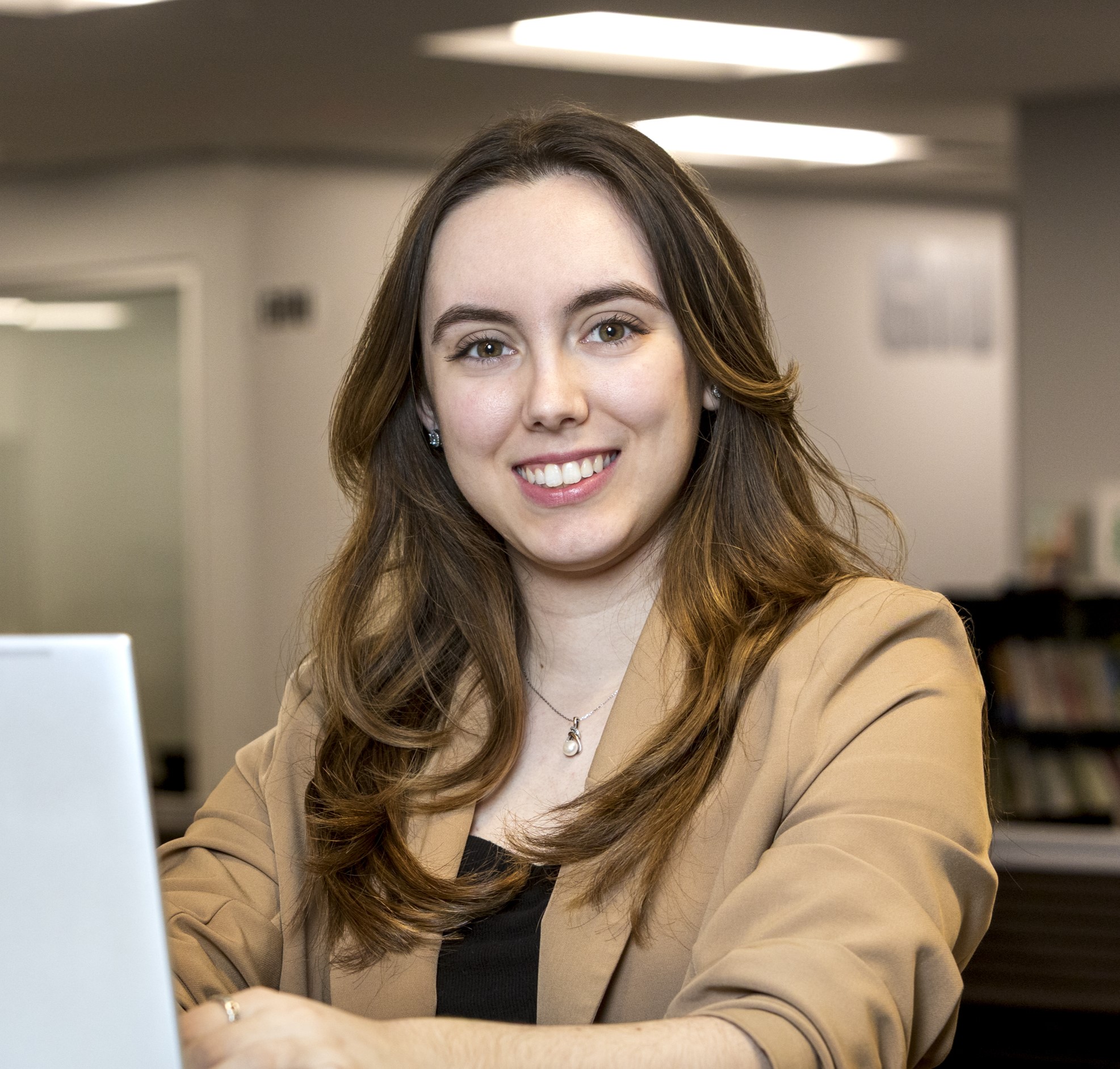 Carly Costanza headshot.jpg